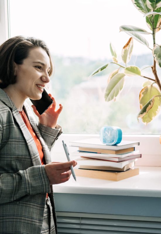legal-business-consultant-legal-advisor-female-lawyer-businesswoman-talking-on-cell-phone.jpg